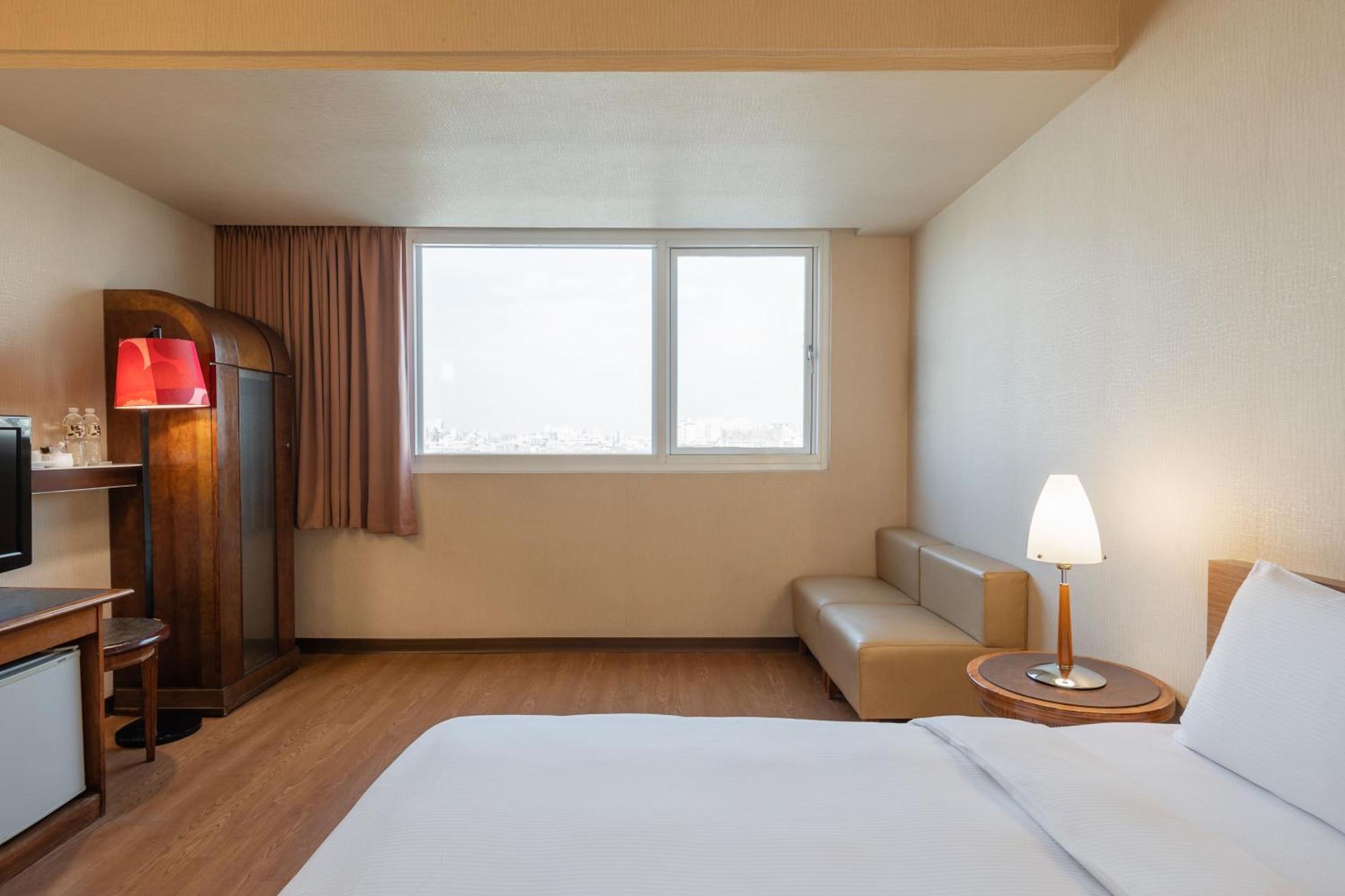 Kindness Hotel Wu-Jia Гаосюн Номер фото
