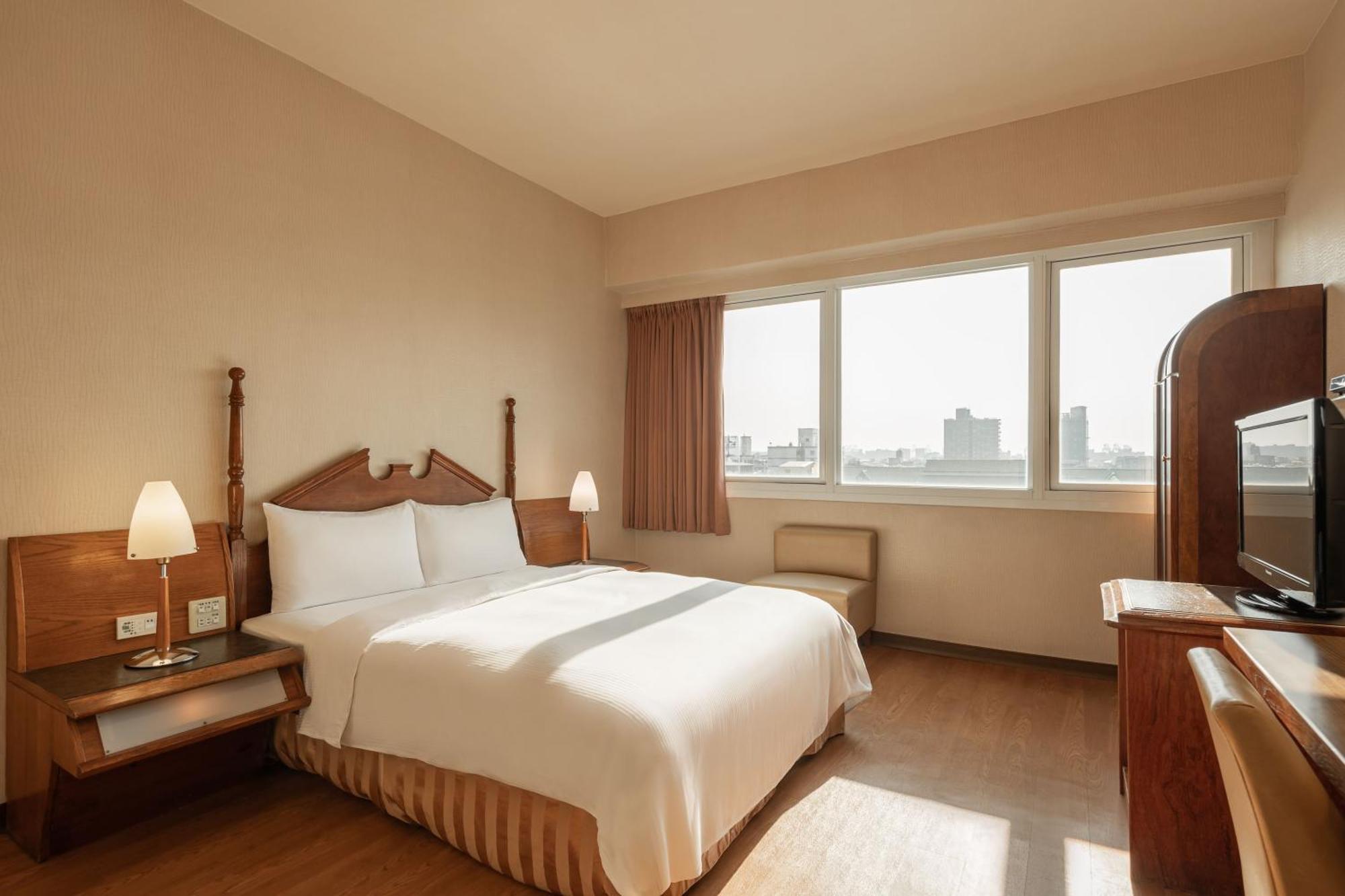 Kindness Hotel Wu-Jia Гаосюн Номер фото