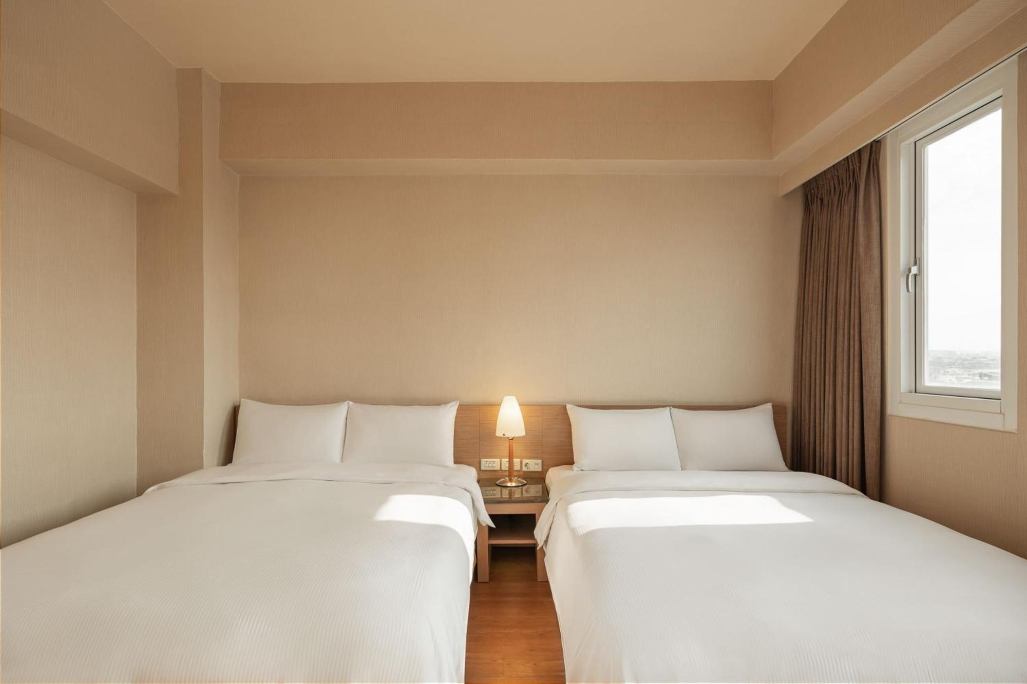 Kindness Hotel Wu-Jia Гаосюн Номер фото