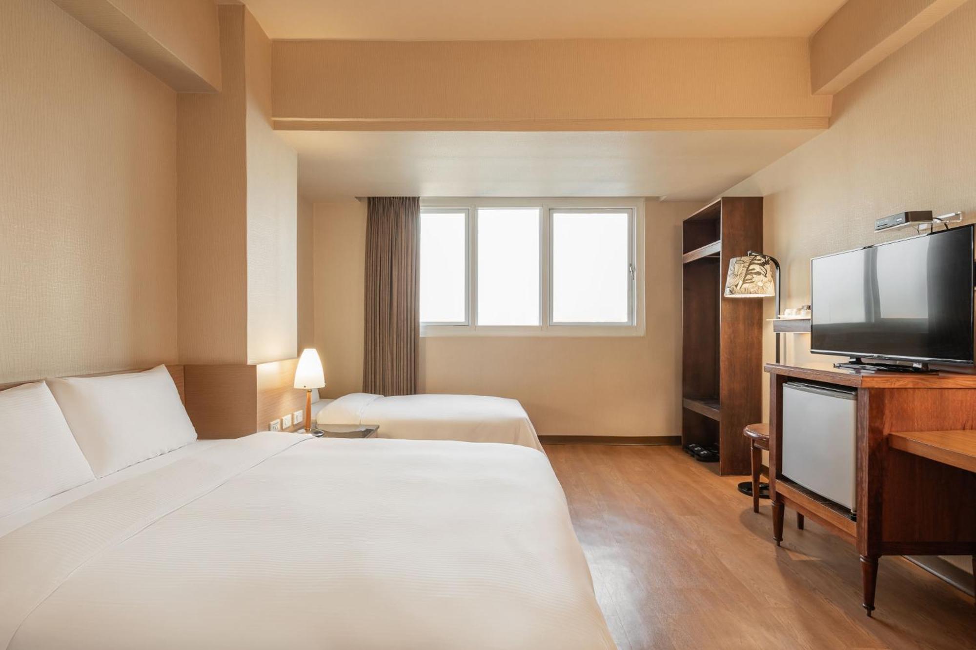 Kindness Hotel Wu-Jia Гаосюн Номер фото