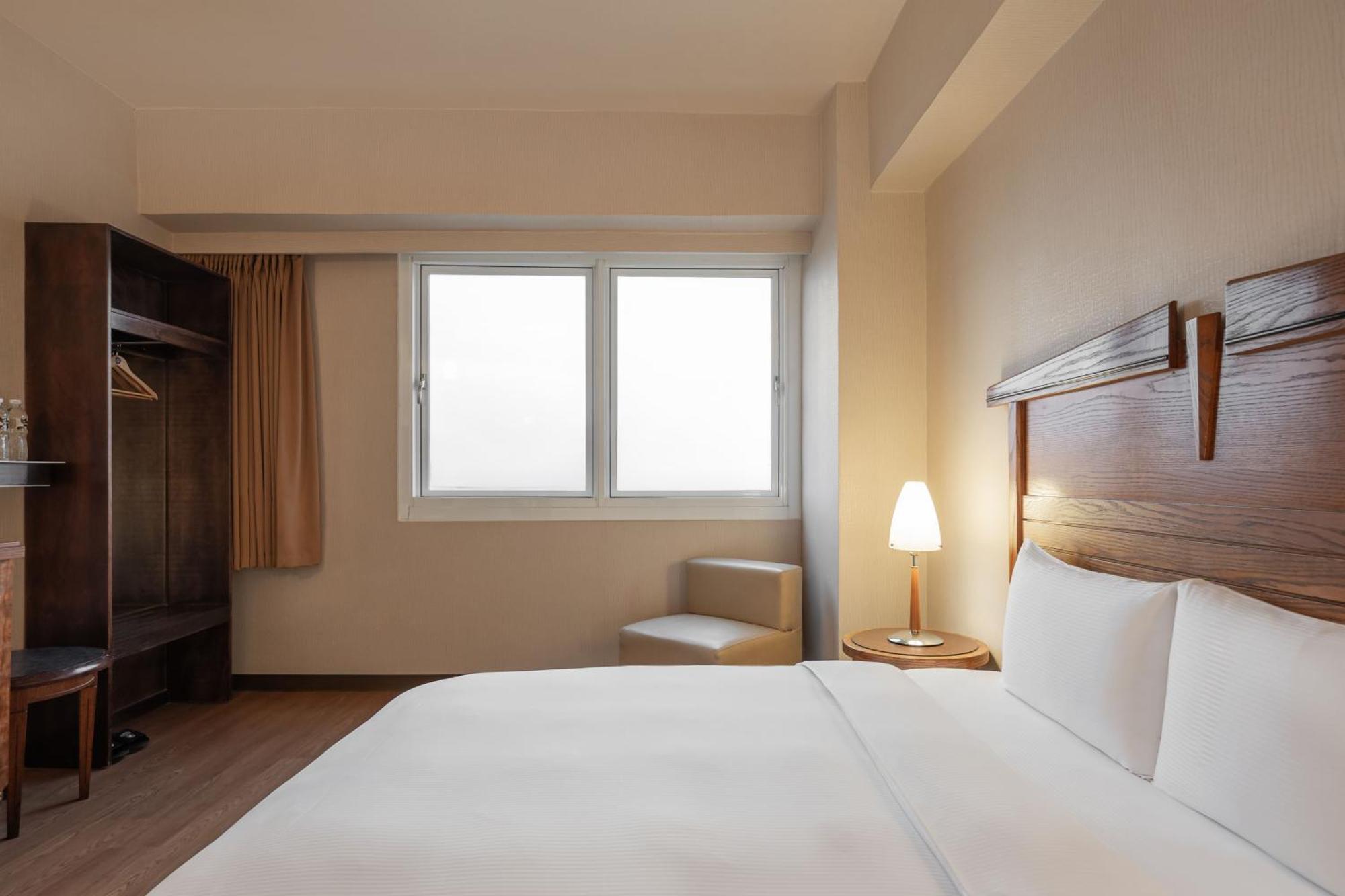 Kindness Hotel Wu-Jia Гаосюн Номер фото